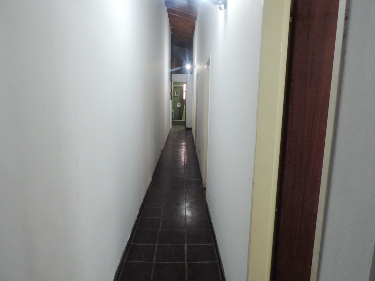 Casa estilo colonial con dos lotes 