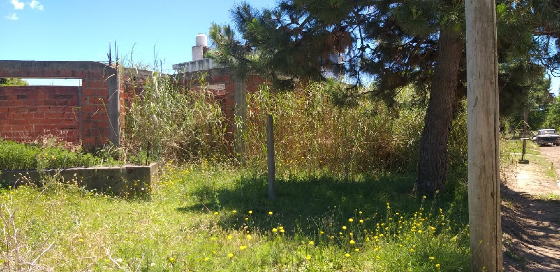 Lote con mejoras planos aprobados
