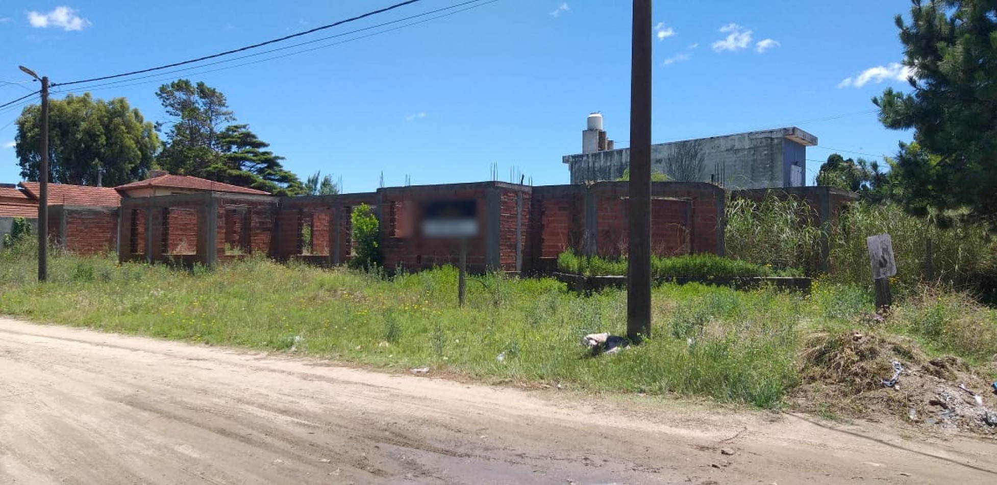 Lote con mejoras planos aprobados