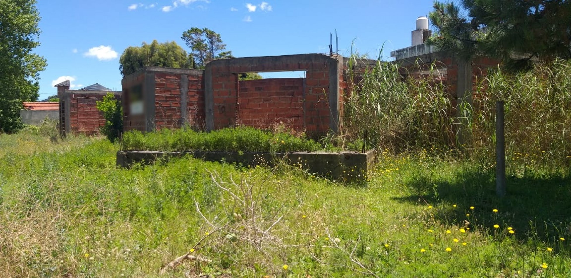 Lote con mejoras planos aprobados