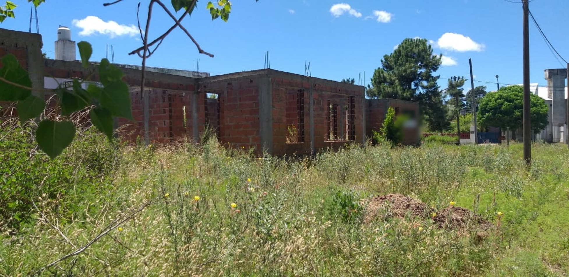 Lote con mejoras planos aprobados