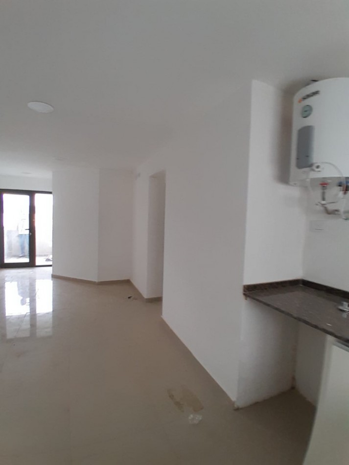 VENDE DEPARTAMENTO FRENTE AL SHOPING