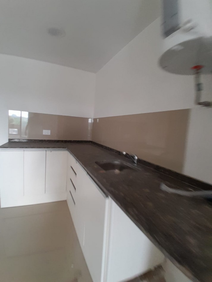 VENDE DEPARTAMENTO FRENTE AL SHOPING