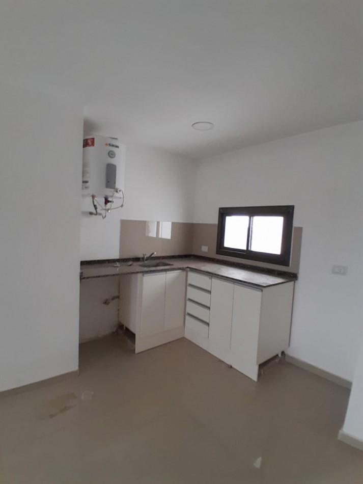 VENDE DEPARTAMENTO FRENTE AL SHOPING