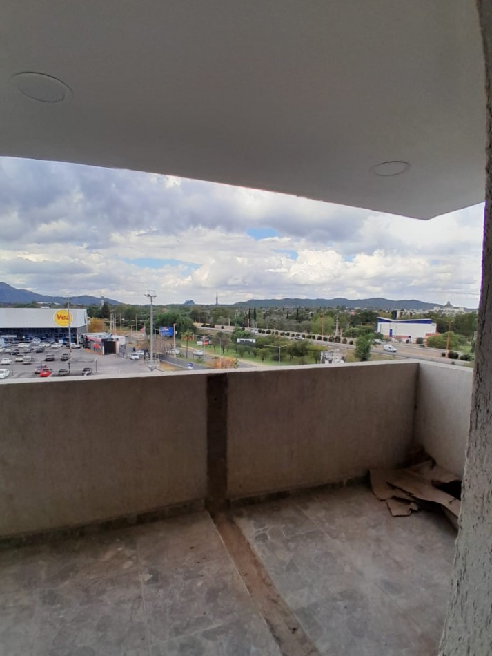 VENDE DEPARTAMENTO FRENTE AL SHOPING