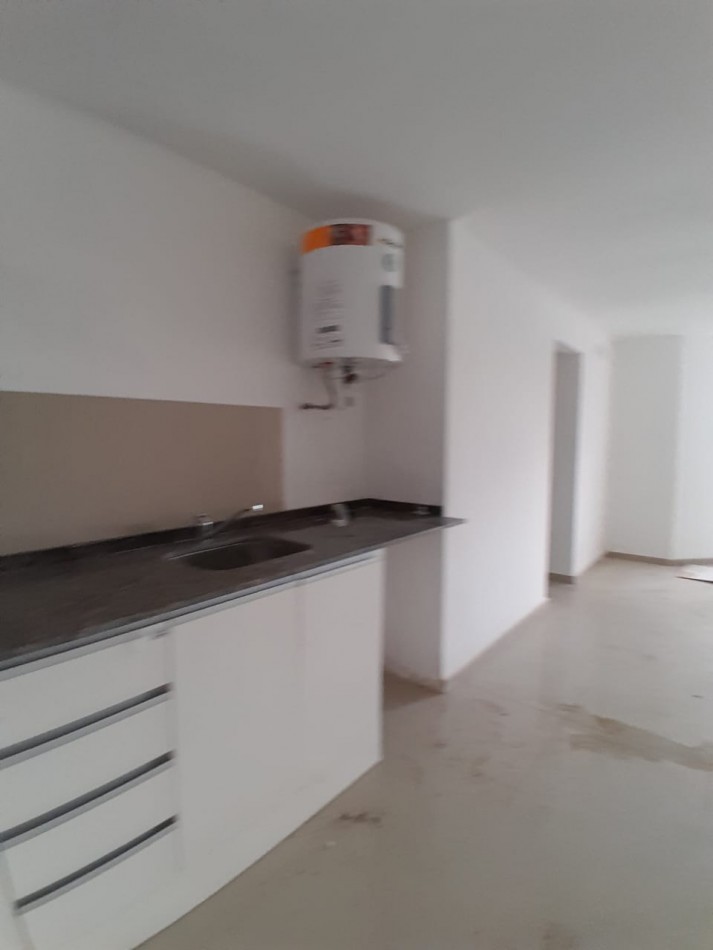 VENDE DEPARTAMENTO FRENTE AL SHOPING