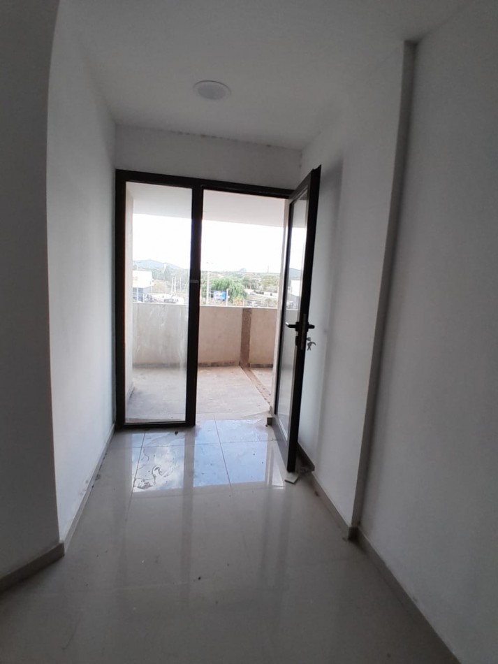 VENDE DEPARTAMENTO FRENTE AL SHOPING