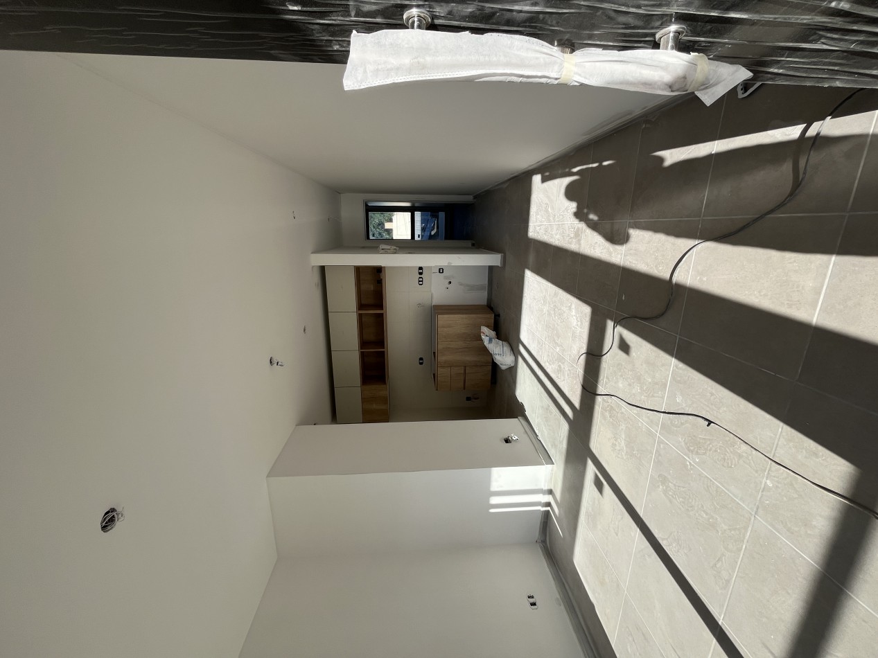 Departamento 2 ambientes P.B con patio Moron