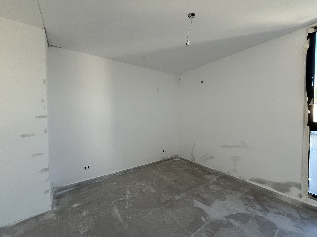 Departamento 2 ambientes P.B con patio Moron