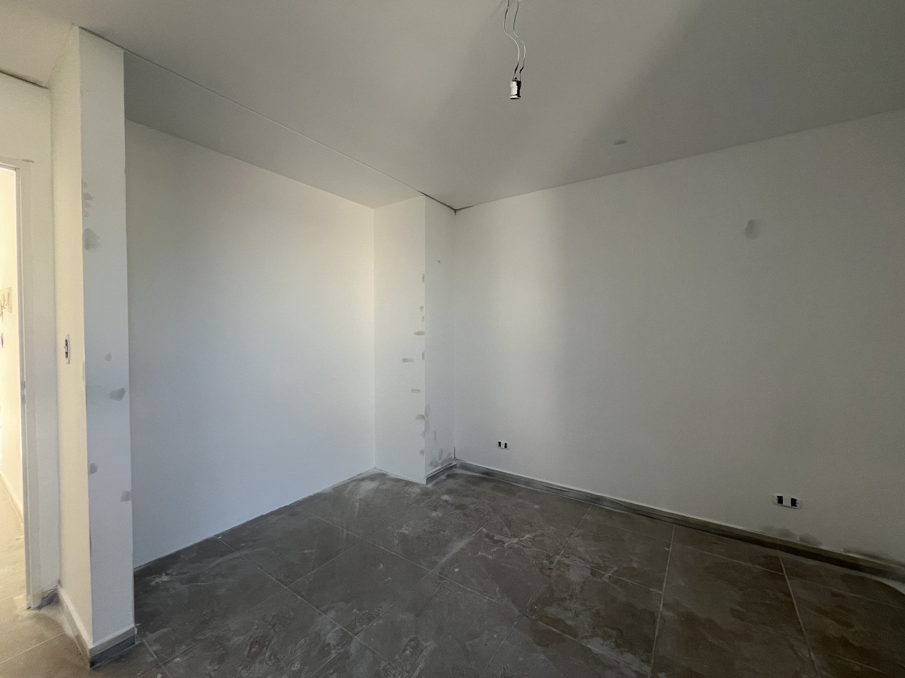 Departamento 2 ambientes P.B con patio Moron
