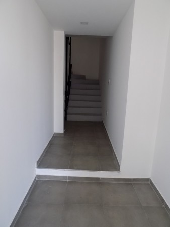 DEPARTAMENTO 2 AMBIENTES AL FRENTE CON PATIO. PLANTA BAJA, DTO A, 58M2. TEMPERLEY.